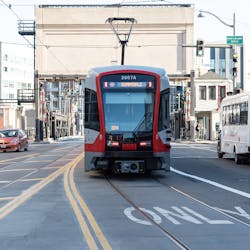 A Sunnydale-bound T Third train approaches the 4th Street Bridge. A Sunnydale-bound T Third train approaches the 4th Street Bridge.