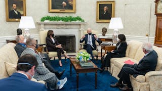President Joe Biden and Vice President Kamala Harris at a bipartisan meeting with Congressional leaders April 12 to promote the administration&apos;s American Jobs Plan.
