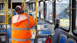 An images from February showing a MARTA employee using sanitizing spray inside a bus. An images from February showing a MARTA employee using sanitizing spray inside a bus.