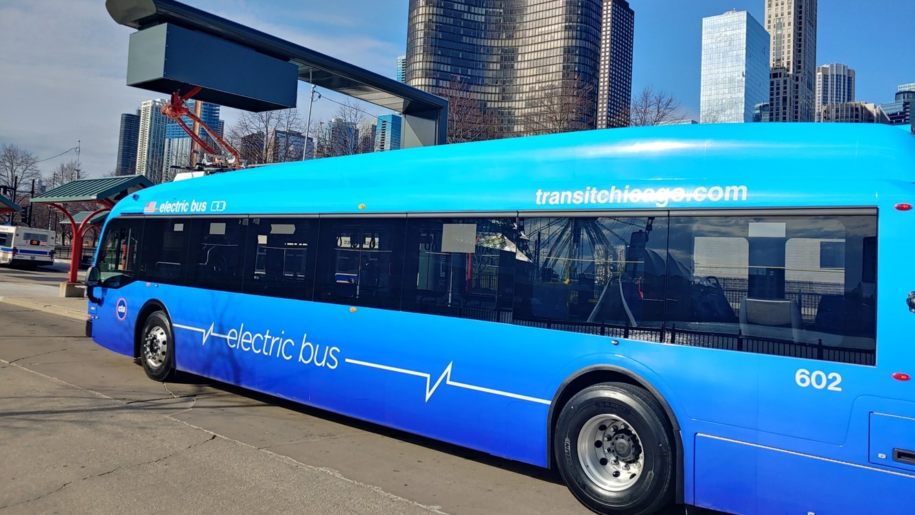 One of CTA's electric buses charging at the Navy Pier bus turnaround.