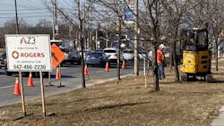 This work crew is using a direction drilling technique to move fiber optics cables for Rogers Communications along Eglinton Avenue West. This work crew is using a direction drilling technique to move fiber optics cables for Rogers Communications along Eglinton Avenue West.