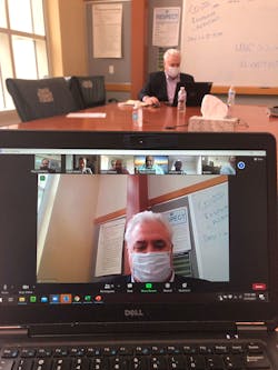 In Chapel Hill, Paul and KJ presented alone in the conference room while staff watched on Zoom to keep with safety protocols.