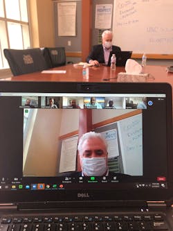 In Chapel Hill, Paul and KJ presented alone in the conference room while staff watched on Zoom to keep with safety protocols. In Chapel Hill, Paul and KJ presented alone in the conference room while staff watched on Zoom to keep with safety protocols.