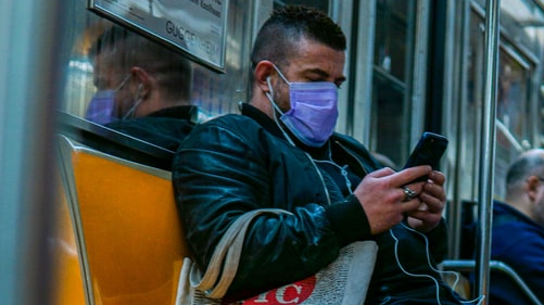 An NYC Transit rider in a mask. The TSA said April 30 it will require air and transit users to properly wear a mask through September 13.