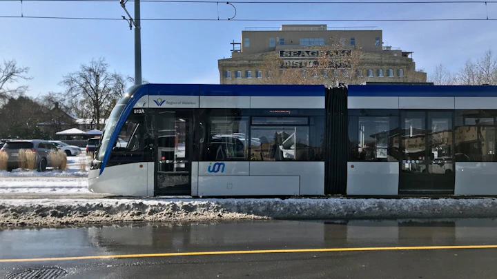 An ION light-rail train operating through the snow.