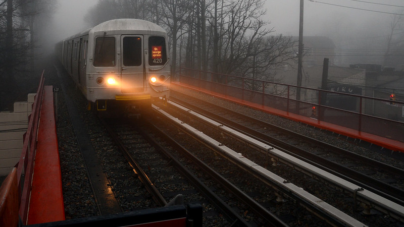 In this 2014 images a St. George-bound train approaches Eltingville station on Staten Island.