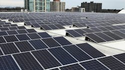 A photo of the solar panels on one of the four GO Stations where they are installed on the roof. A photo of the solar panels on one of the four GO Stations where they are installed on the roof.