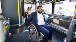 Quemuel Arroyo tests out a new bus vehicle.