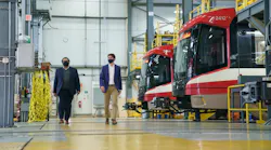 Calgary Mayor Naheed Nenshi, left, and Canada Prime Minister Justin Trudeau visit at the Calgary Transit Oliver Bowen Maintenance Facility on July 7, 2021.