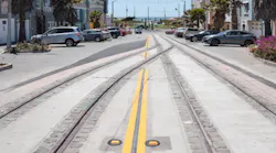 New tracks with decorative cobbles at 46th Avenue.