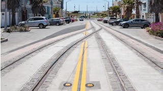 New tracks with decorative cobbles at 46th Avenue.