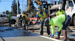 Crews with Raimore Construction perform concrete work for the Division Transit Project.