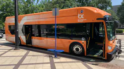 A Birmingham Xpress branding bus on display at a July event.