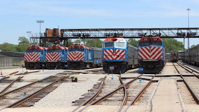 Metra trains in a yard: U.S. commuter rail operators, like Metra, are facing a hardening liability insurance market, which is prompting industry advocates to ask for federal action.
