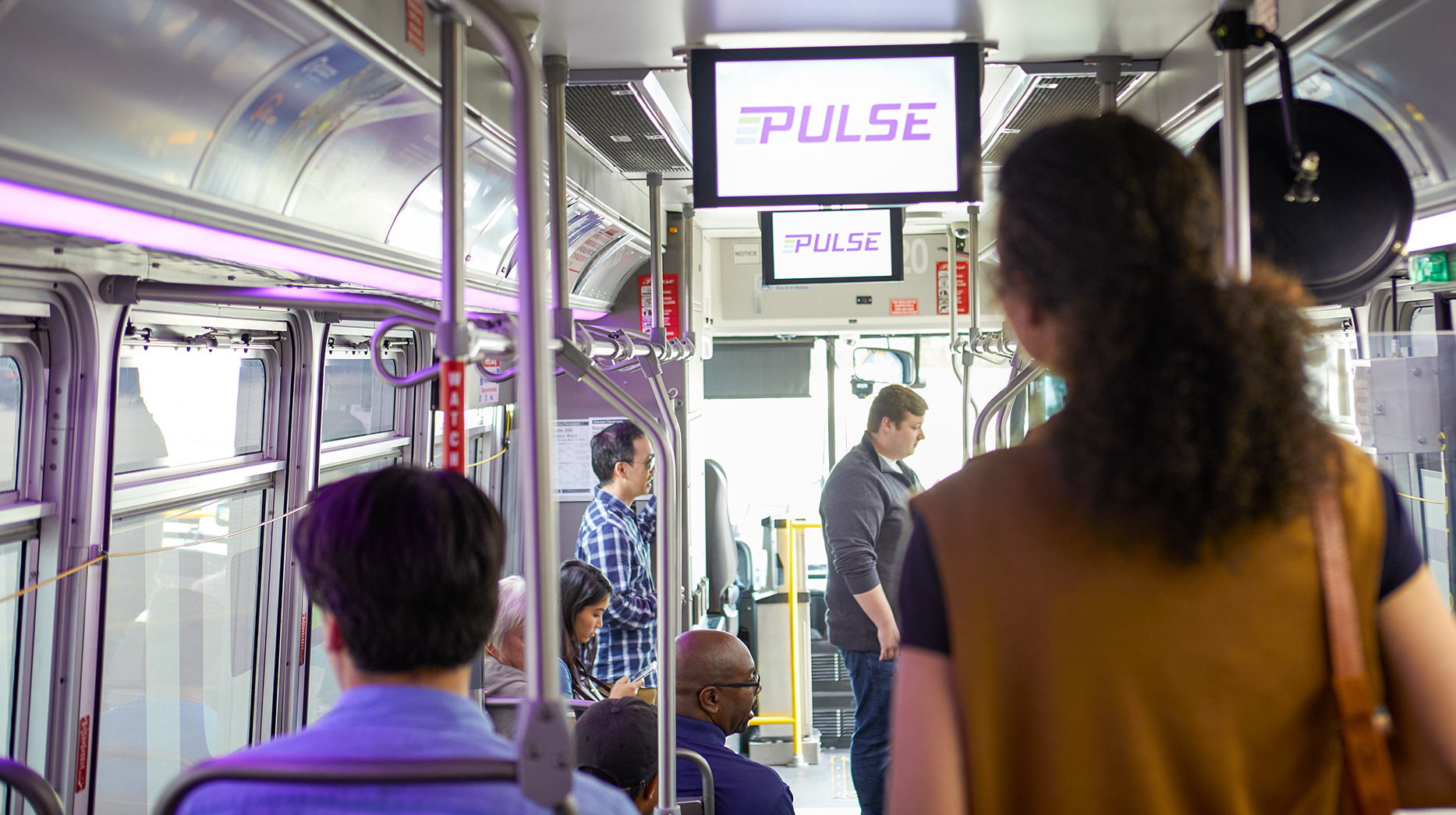 An interior of an existing Pace PULSE route (image taken pre-COVID).