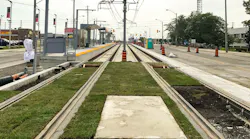 The partially installed green track mock-up at Warden Avenue’s Golden Mile stop looking west.