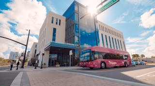 A LYNX bus waiting for a light at UCF&apos;s Dr. Phillips Academic Commons in downtown Orlando. Photo taken prior to COVID-19.
