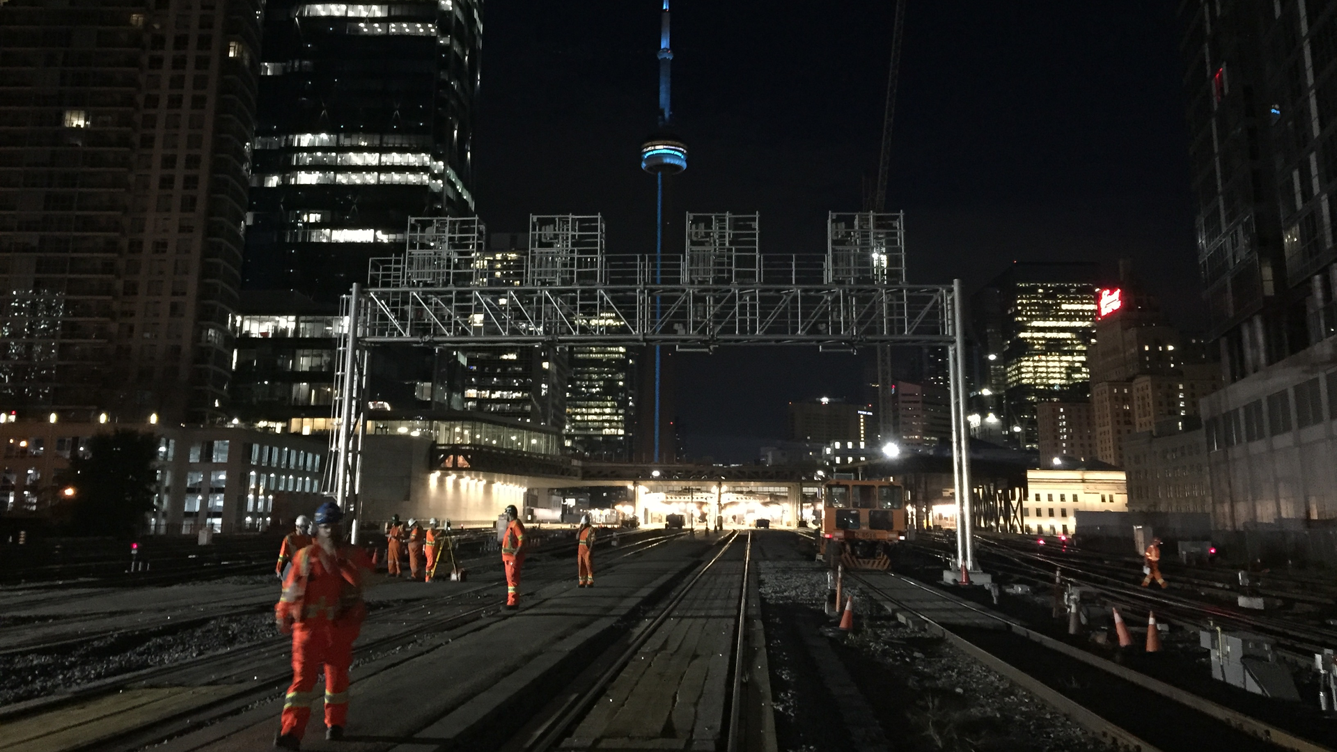 Night construction of a signal bridge along the Union Station rail corridor.