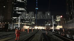 Night construction of a signal bridge along the Union Station rail corridor.