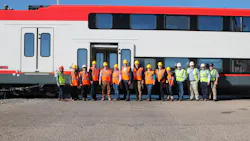 The teams from TTCI, Caltrain and Stadler with John Putnam (Deputy General Counsel for the U.S. Department of Transportation) an Cindy Terwilliger (FTA Region 8 Regional Administrator) in front of the new electric EMU in Pueblo, Colo.