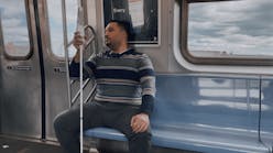 WeWALK user sitting in a passenger train