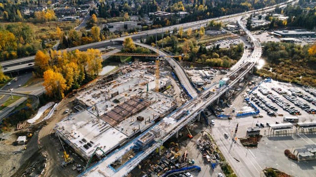 Beautiful fall colors around Lynnwood Link construction, with I-5 in the background.