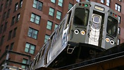A CTA Brown Line train to Kimball travels on elevated tracks in downtown Chicago. A CTA Brown Line train to Kimball travels on elevated tracks in downtown Chicago.