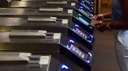 In this August 2019 image, a New York City Transit patron taps into the system using a credit/debit card. MTI is urging action to protect PII as more transit systems expand data collection through platforms such as contactless fare systems.
