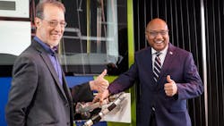 General Manager Sam Desue Jr. and Oregon State Sen. Michael Dembrow give a thumbs up after fueling a TriMet bus with renewable diesel. General Manager Sam Desue Jr. and Oregon State Sen. Michael Dembrow give a thumbs up after fueling a TriMet bus with renewable diesel.