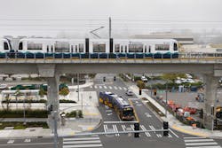 A Sound Transit light rail train leaves the Northgate station as a King County Metro bus passes underneath on Oct. 2, 2021 in Seattle. A Sound Transit light rail train leaves the Northgate station as a King County Metro bus passes underneath on Oct. 2, 2021 in Seattle.