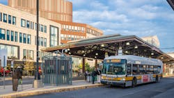 A Route 23 bus puling into a stop; the route is one of three that will operate without charging fares starting March 1 as part of a two-year program in Boston, Mass.