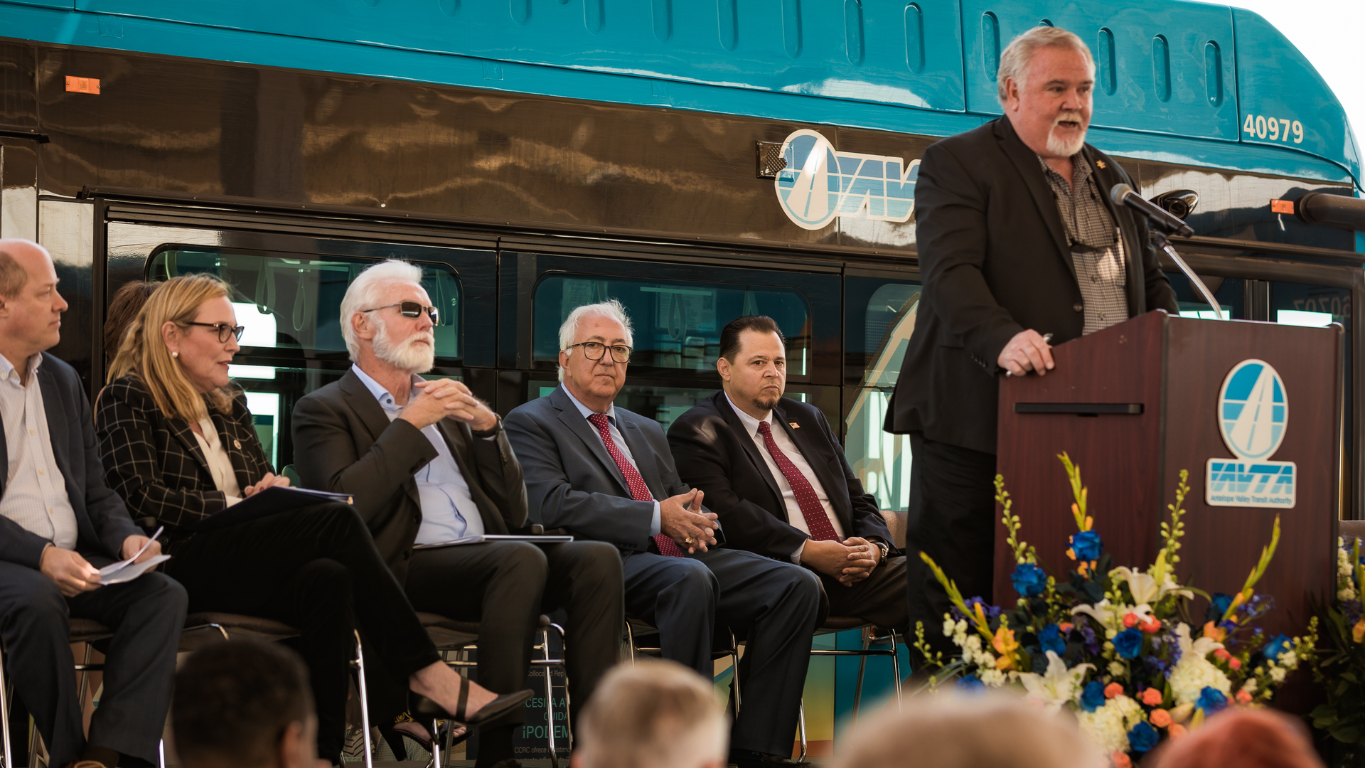 AVTA Chairman of the Board Marvin Crist speaks at the authority's March 16 event marking its complete transition to a zero-emission fleet.