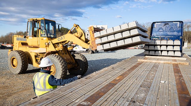 Concrete crossties for use on the Purple Line project are unloaded in March 2021.