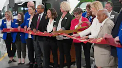 Kansas Gov. Laura Kelly, center right with scissors, with FTA Administrator Nuria Fernandez, celebrates the opening of OCCK, Inc., Transportation's expanded facility in Salina and announced the awarding of more than $13 million in transit grants through the AIC Public Transit Program.