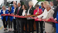 Kansas Gov. Laura Kelly, center right with scissors, with FTA Administrator Nuria Fernandez, celebrates the opening of OCCK, Inc., Transportation&apos;s expanded facility in Salina and announced the awarding of more than $13 million in transit grants through the AIC Public Transit Program.
