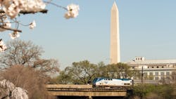 An Amtrak train in Washington, D.C., on a spring day.