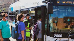 Riders board an EMBARK bus in June 2021. [photo credit: EMBARK]