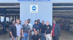 New Orleans RTA officials including CEO Alex Wiggins (back center) visited Louisiana State Penitentiary&apos;s auto mechanic program. New Orleans RTA is partnering with JOB1 NOLA and the Louisiana Workforce Commission to recruit mechanics and technicians from the program.