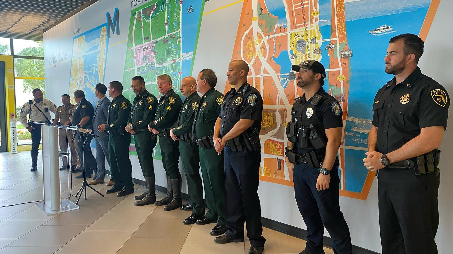 Officers and representatives from Brightline, Broward County Sheriff's Office and area law enforcement agencies gathered June 3 for a press conference to highlight Operation Crossing Guard.