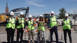 Officials used spike mauls to drive gold spikes into ties to mark the start of construction of the South Shore Double Track NWI project on June 21.