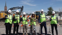 Officials used spike mauls to drive gold spikes into ties to mark the start of construction of the South Shore Double Track NWI project on June 21. Officials used spike mauls to drive gold spikes into ties to mark the start of construction of the South Shore Double Track NWI project on June 21.