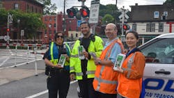 MTA Police and Metro-North representatives during a Level Crossing Awareness event in June 2022. MTA is one of several entities to receive federal funding to support its trespassing and suicide prevention efforts. MTA Police and Metro-North representatives during a Level Crossing Awareness event in June 2022. MTA is one of several entities to receive federal funding to support its trespassing and suicide prevention efforts.