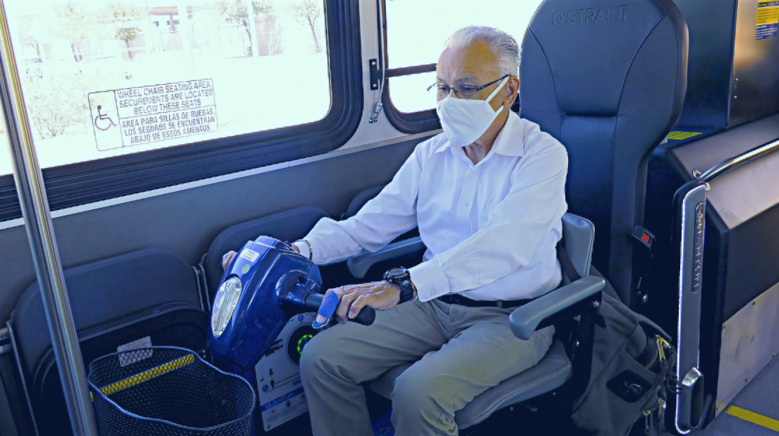 Rider In Scooter Uses Quantum Device On A Sun Tran Bus 62bc70b3f13c4