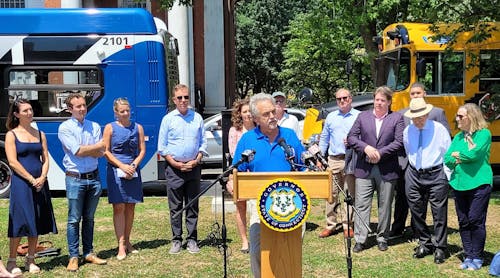 Oficials and environmental stakeholders gathered on the New Haven Green to announce the new law.