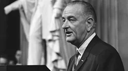 President Lyndon B. Johnson gives remarks inside the U.S. Capitol rotunda before signing the Voting Rights Act in August 1965.