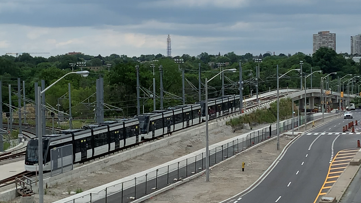 A three-car train being tested along the Eglington Crosstown alignment.