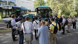 InnoTrans 2018 attendees view buses while on a tour of the expo. InnoTrans 2018 attendees view buses while on a tour of the expo.