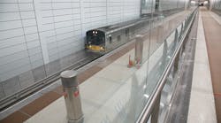 A LIRR train moves through the new platform of the new Grand Central Madison.