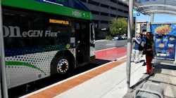 An eGen Flex Hybrid Bus Parked at the Super Stop on Delaware and New York streets. An eGen Flex Hybrid Bus Parked at the Super Stop on Delaware and New York streets.