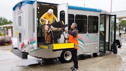 Palm Tran Connection Service Coordinator Israel Aray helps Bettye-Jane Bonin off a Palm Tran Connection paratransit passenger van that arrived at the Special Needs Evacuation Center at the South Florida Fairgrounds on Wednesday, Nov. 9, 2022. Bonin was picked up at her home and brought to the shelter hours before Hurricane Nicole was to make landfall on the east coast of Florida. Palm Tran Connection Service Coordinator Israel Aray helps Bettye-Jane Bonin off a Palm Tran Connection paratransit passenger van that arrived at the Special Needs Evacuation Center at the South Florida Fairgrounds on Wednesday, Nov. 9, 2022. Bonin was picked up at her home and brought to the shelter hours before Hurricane Nicole was to make landfall on the east coast of Florida.